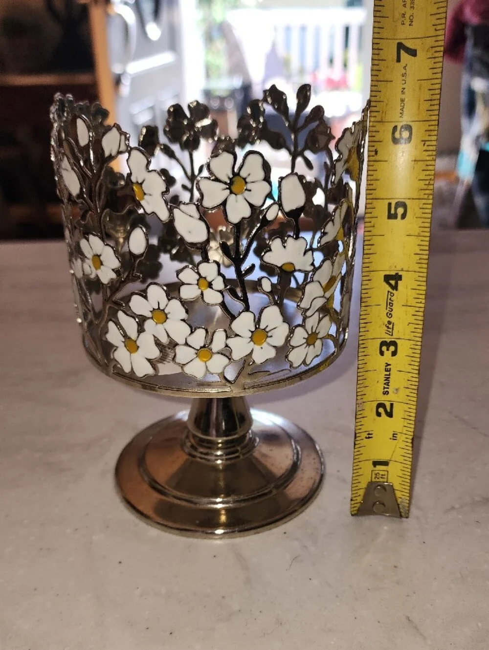 Floral Cutout Metal Pedestal Candle Holder in White and Gold